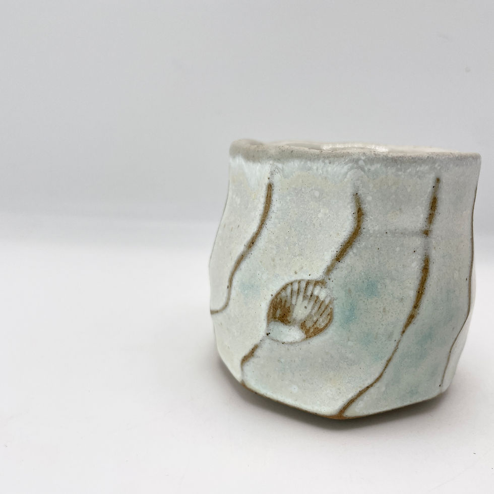 Thumbnail: Small faceted cup in soft white