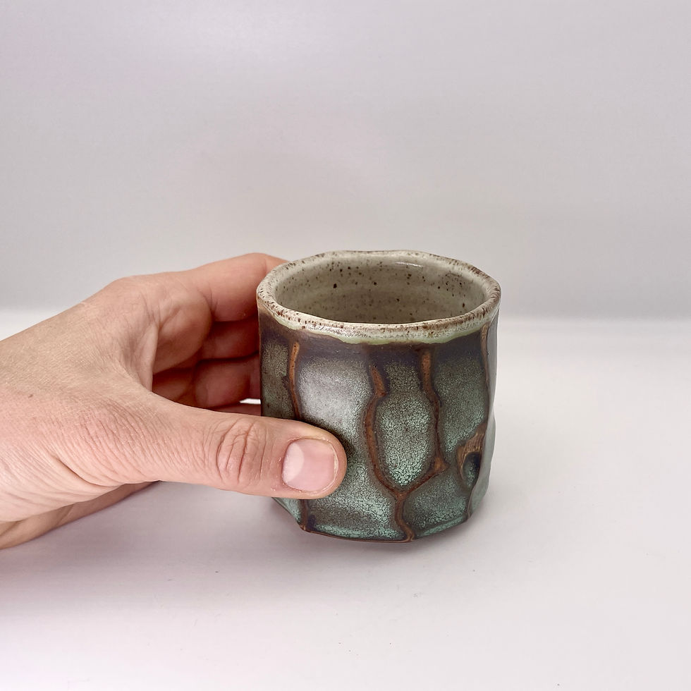 Thumbnail: Faceted cup in weathered green