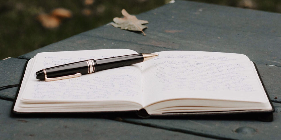 a pen and a notebook