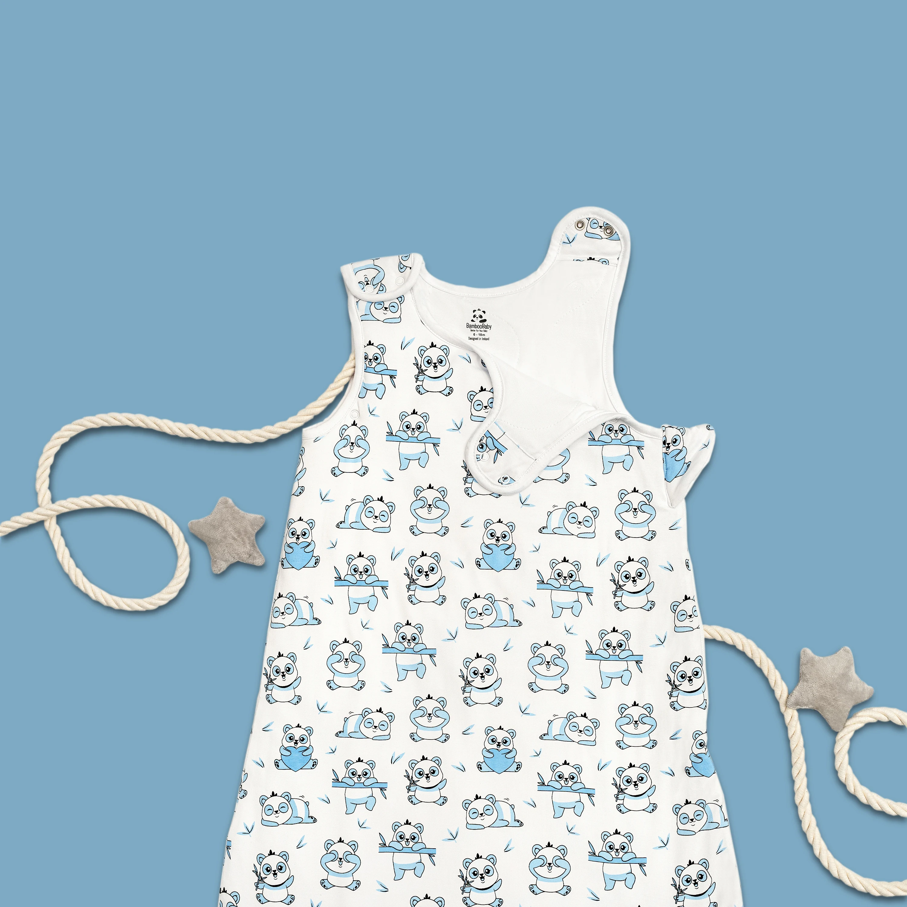 A close-up of a BambooBaby baby sleeping bag highlighting the adorable blue panda print detail.