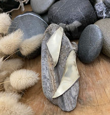 Wavy triangular silver earrings.