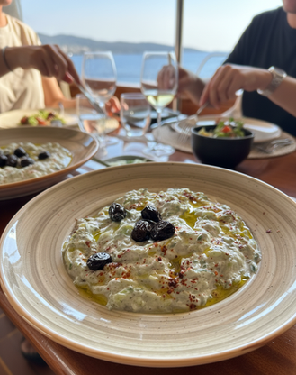 Lunch onboard Sailing Chef with Mezze anchored in a hidden cove in the Turquoise Sea