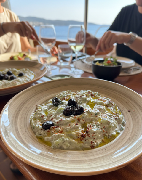 Lunch onboard Sailing Chef with Mezze anchored in a hidden cove in the Turquoise Sea