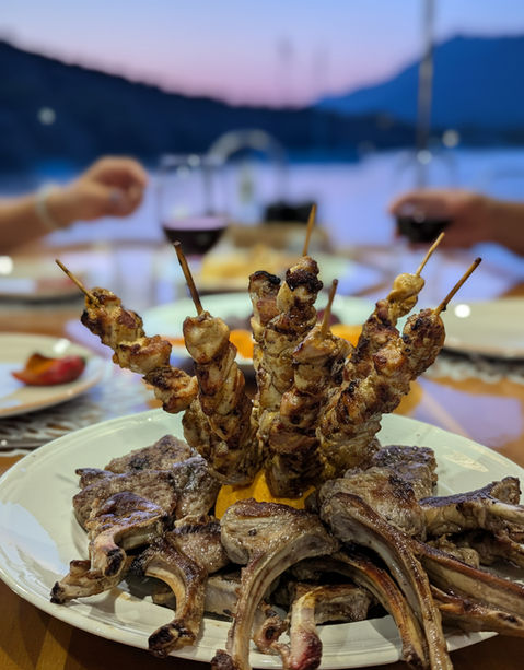 Barbecue dinner onboard Sailing Chef anchored in a gorgeous bay in the Mediterranean Sea.