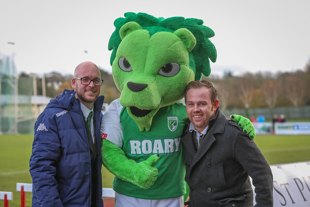 Nic Legg and Aaron Davies with Roary the GFC Lion