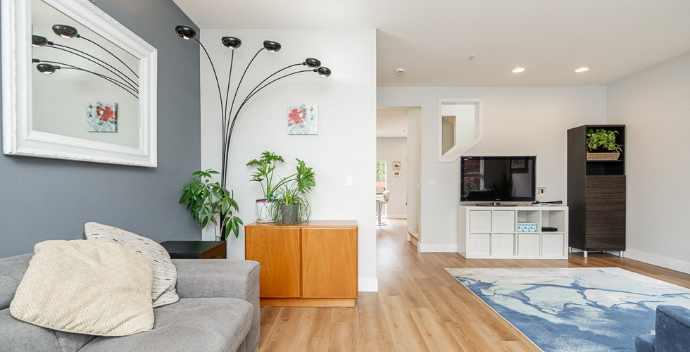 Renovated kitchen with new cabinets and countertops at 117 1055 Riverwood Gate Port Coquitlam.