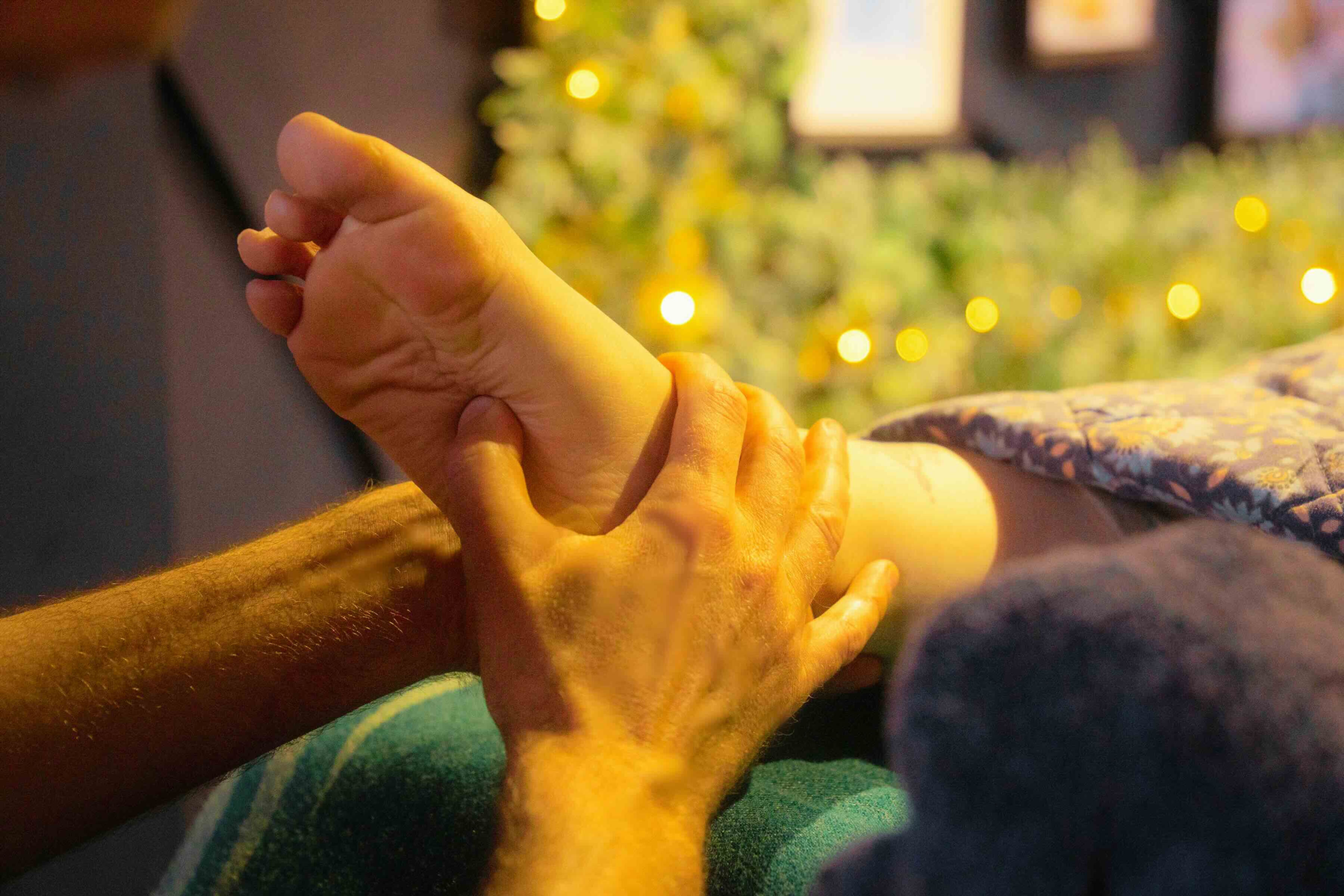 Reflexology foot massage at Indulge Massage Therapy Doncaster, enhancing relaxation and wellbeing in a calming spa environment.