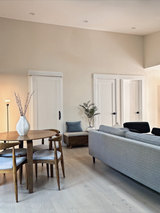 A 1,000-square-foot detached ADU in Lafayette offers two bedrooms, a dedicated office, and an open living space under a vaulted ceiling with skylights.