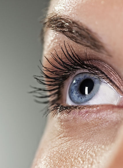 Blue eye on grey background