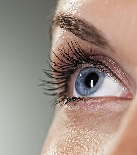 Blue eye on grey background