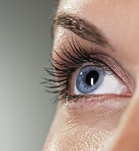 Blue eye on grey background