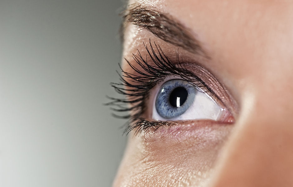 Blue eye on grey background