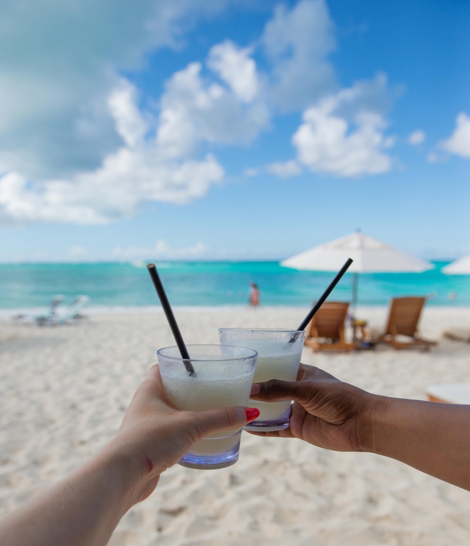 Raising a glass on the beach