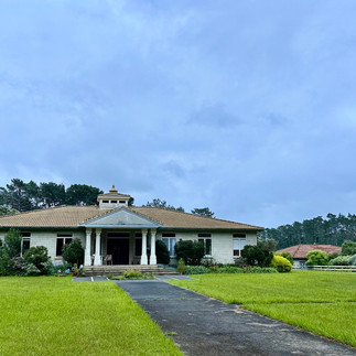 Main building containing kitchen, dining, meditation, and meeting halls