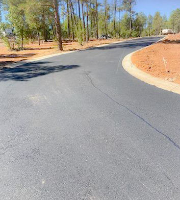 Smooth paved road inside Woodside RV park