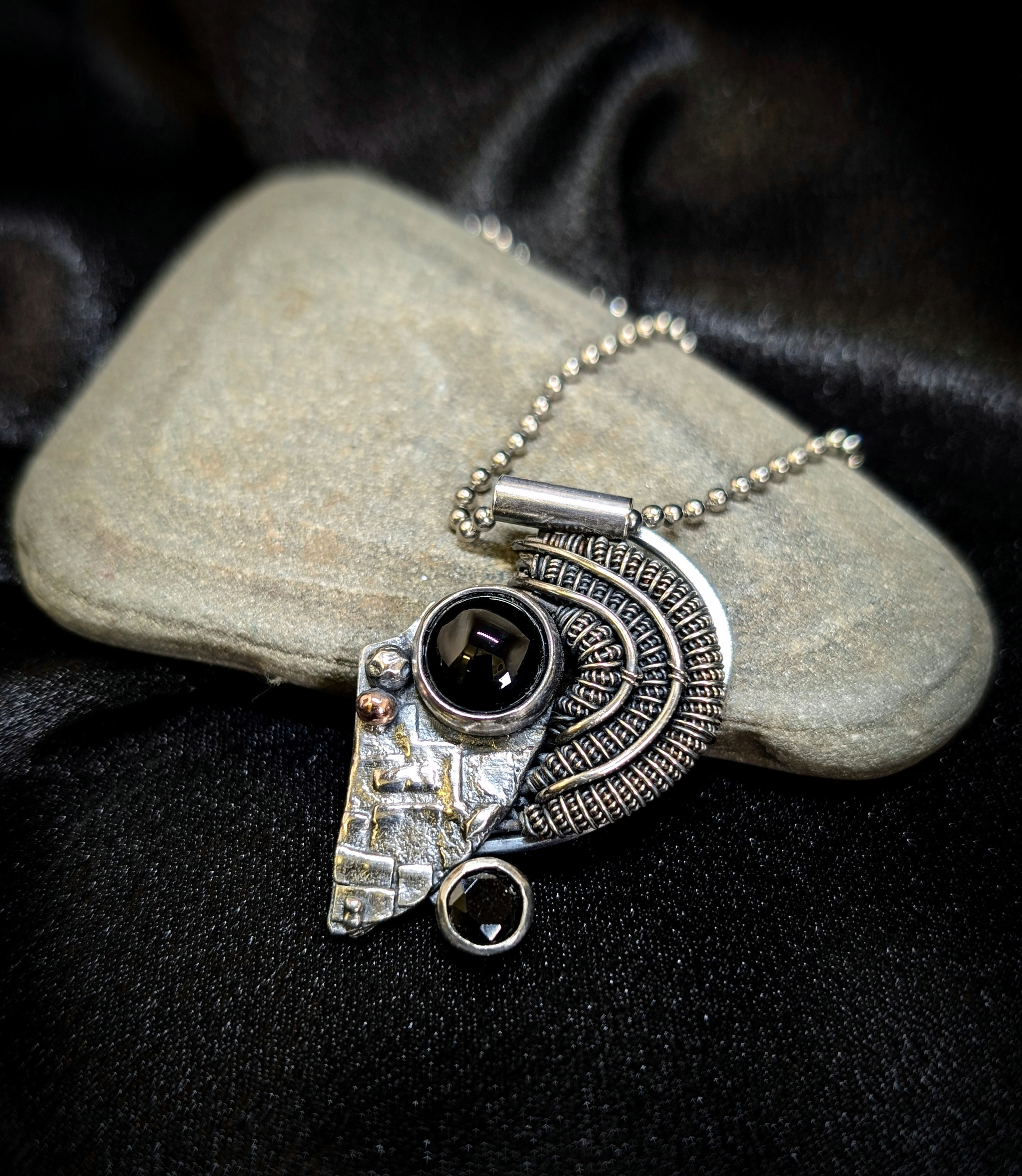 Agate and cubic zirconia and sterling silver tech pendant.
