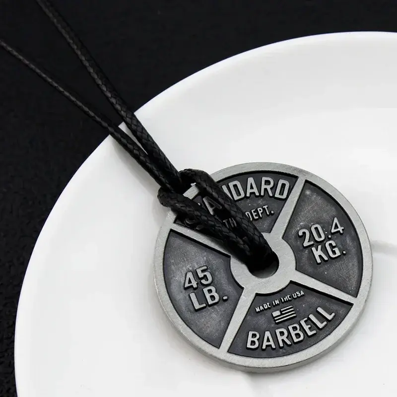Thumbnail: Fitness-inspired weight plate necklace with vintage metal finish