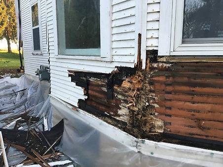 damage-white-siding