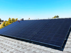 Solar panel array installed on a rooftop.