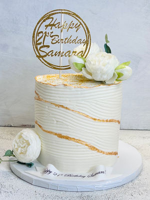 Buttercream Textured cake with flowers.jpeg