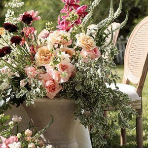 Floral Designs on corner table, outside venue in the RGV