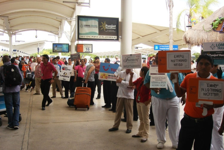 Airport arrival crowd with signs, airport transport transfer