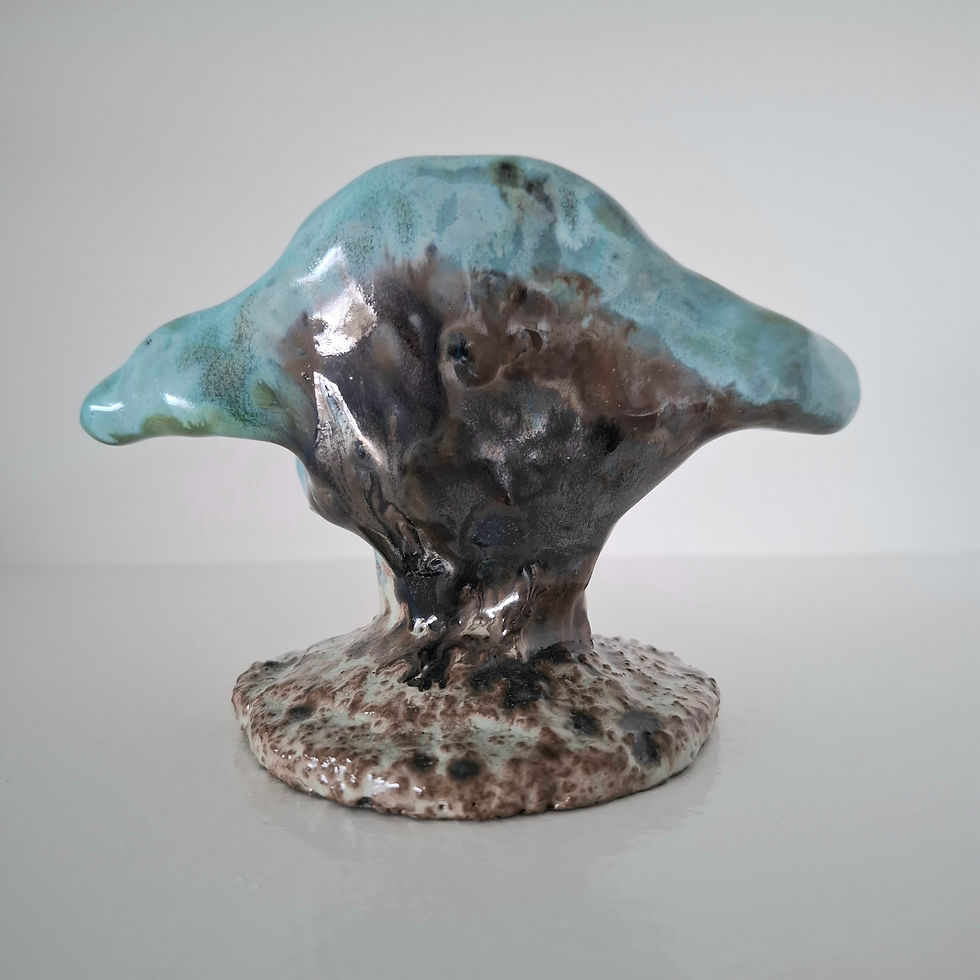 Miniaturebillede: Klogeåge figur i keramik