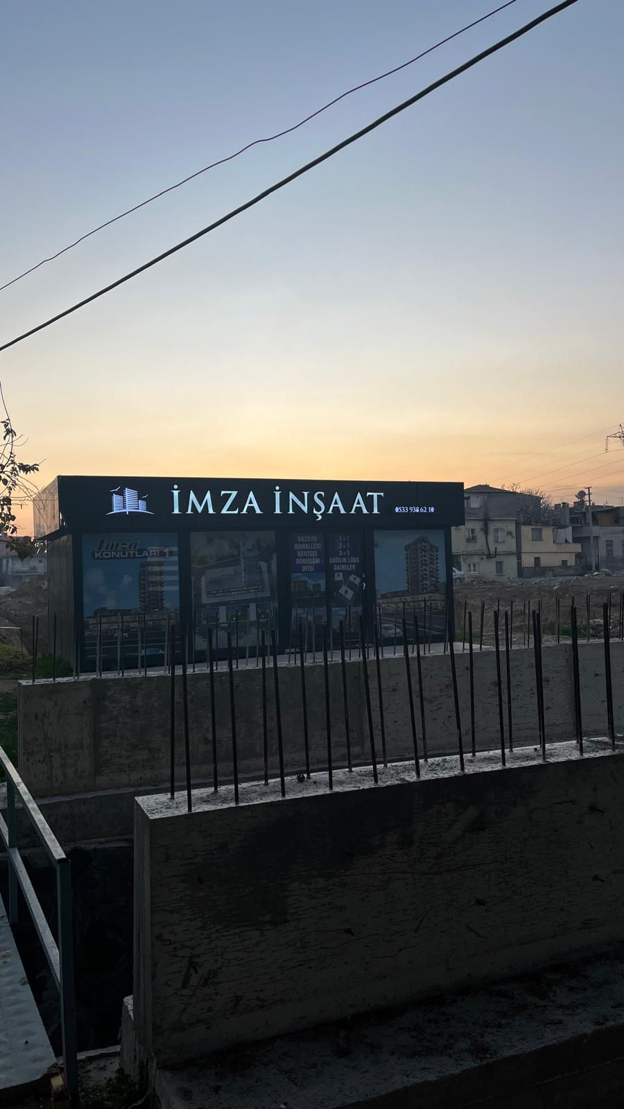 Tarsus İmza İnşaat ofis binası gün batımı görünümü