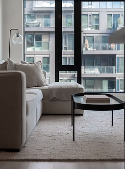 Clean Living room area with couch