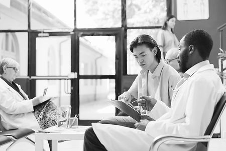 african-american-doctor-helping-asian-patient-to-f-2025-02-19-16-52-17-utc_edited.jpg