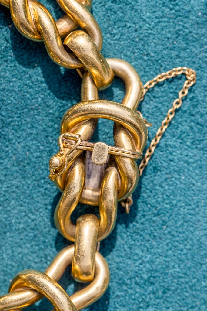 Thumbnail: Heavy vintage 18ct gold chunky knot link bracelet with oversized solid sculptural links and hidden clasp.