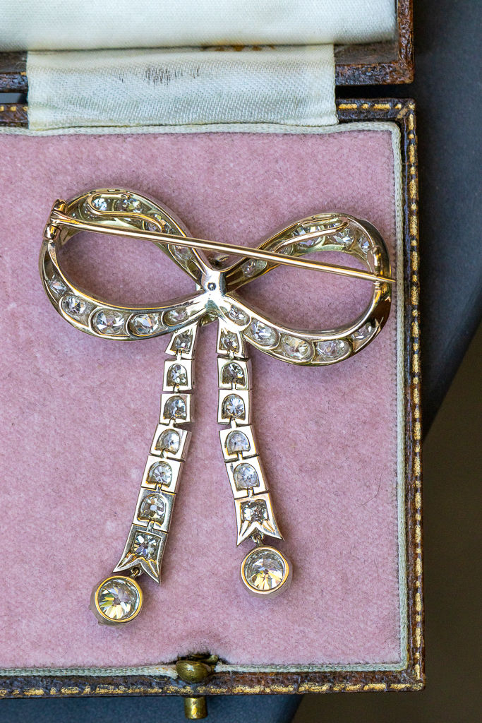 Thumbnail: Late Victorian Diamond Bow Brooch-Pendant with Articulated Ribbons, circa 1900