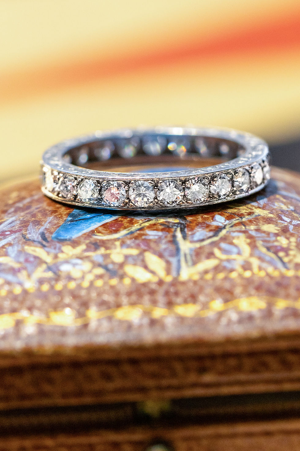 Miniature : Overhead image of 1.75ct transitional cut diamonds in a continuous platinum eternity setting.