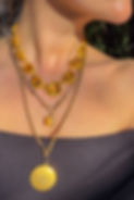 Antique citrine necklace styled layered with gold chains