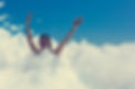 Happy young woman dancing on beach foam party.jpg