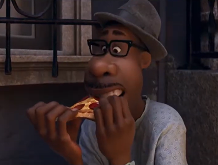 Joe Gardner eating pizza