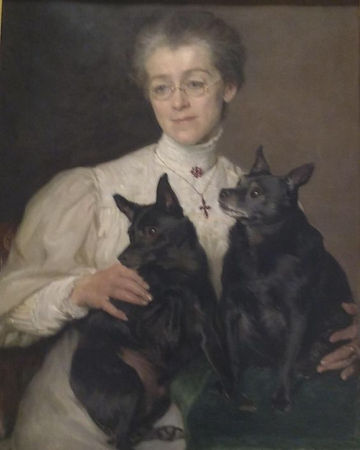 Schilderij van de dochter van kolonel Temple, met haar 2 schipperkes, circa 1900..jpg
