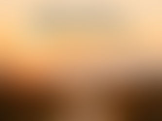 Winding dirt path through golden terrain leading toward a sunrise over distant hills, symbolizing emotional release and the journey toward peace.