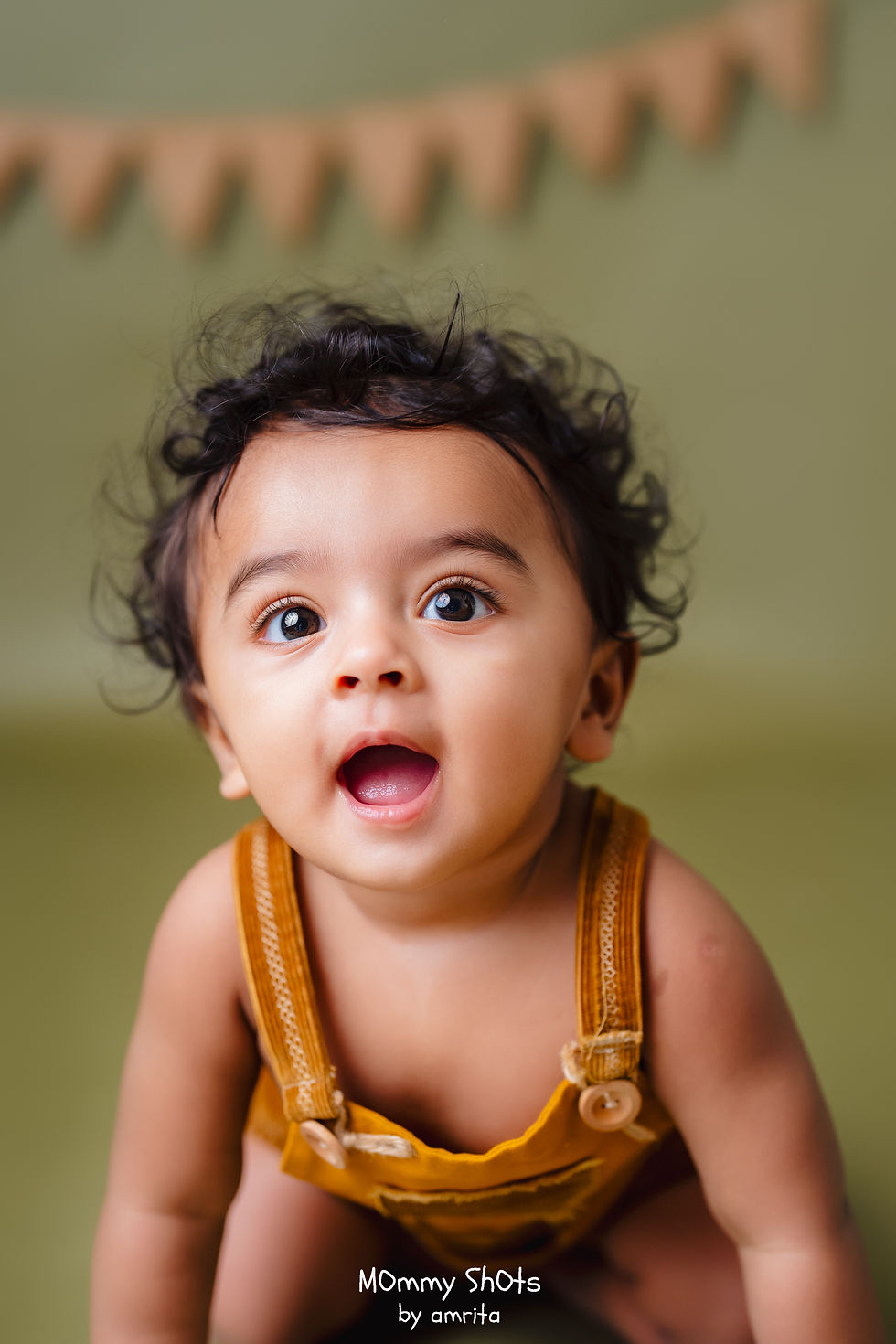 Neutral, classic outfits for baby photoshoots in Bangalore