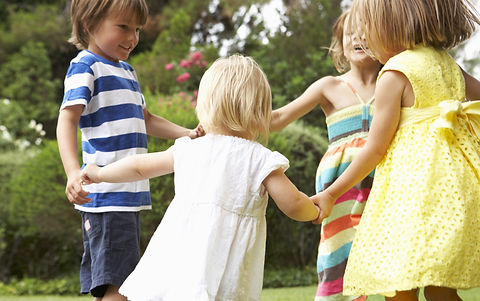 Group Of Children Playing Outdoors Together_edited.jpg