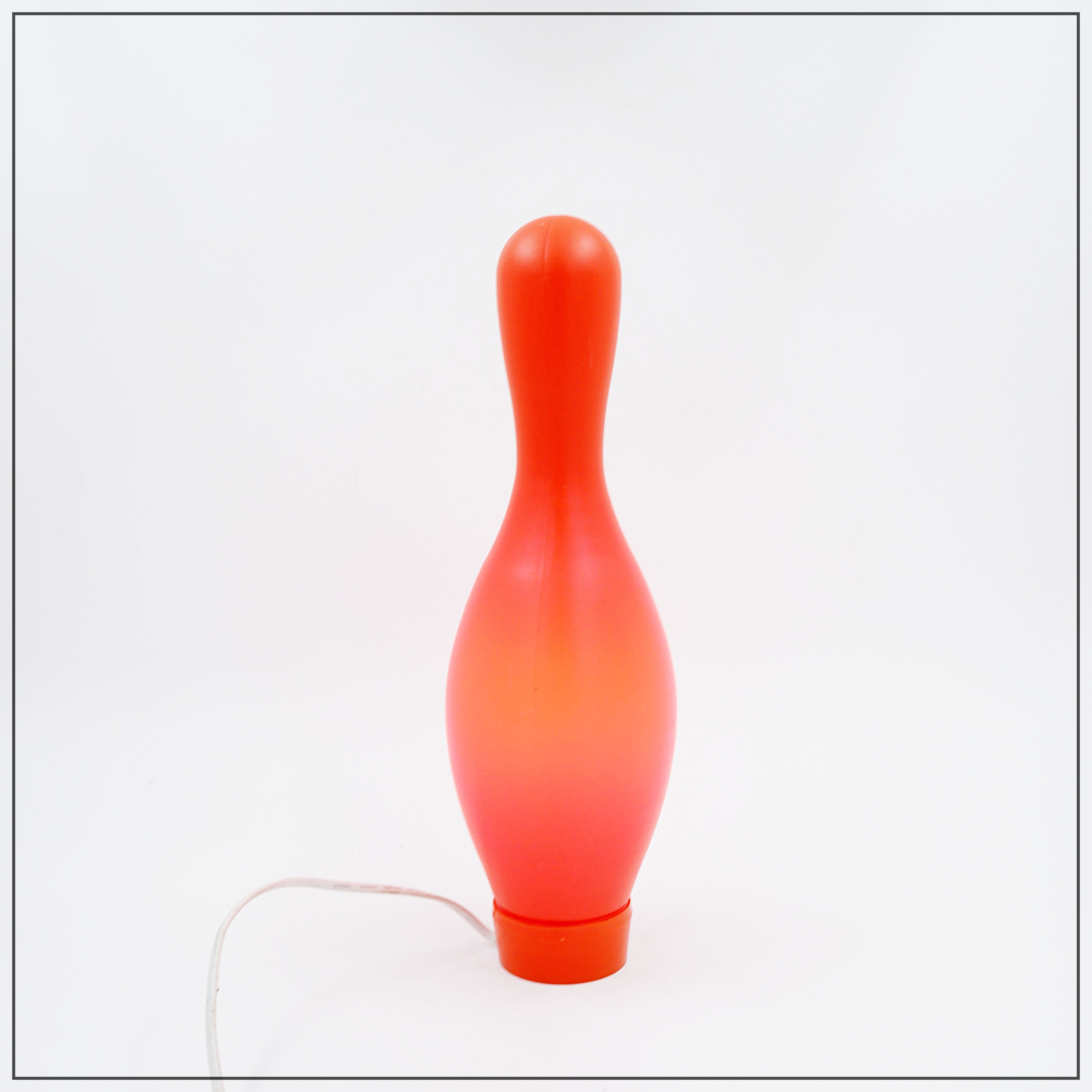 "Knock-off Bowling Pin" table lamp designed by Josh Owen for Bozart in 2002.