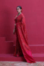 Lightweight drape of a Burnt Red Pashmina Banarasi showing the matte luster and fluid fall