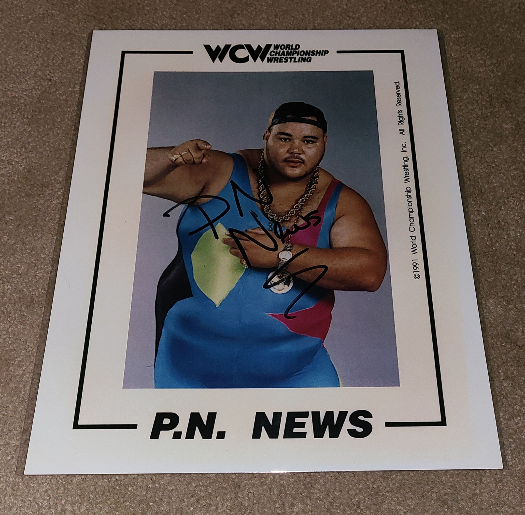P.N. News - WWE / WCW - Autographed 8.5×11