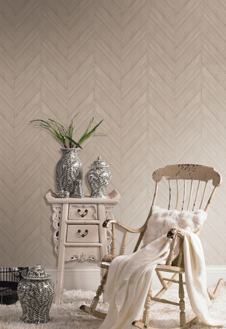 Beige chevron wallpaper, rocking chair, and side table