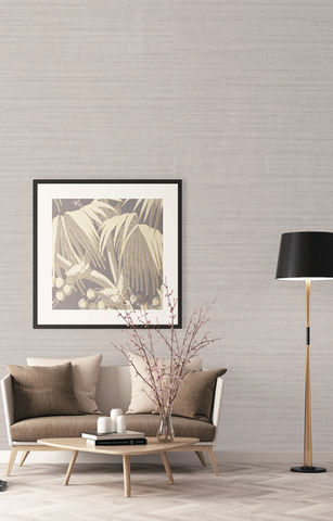 Serene living room with framed art and textured wallpaper