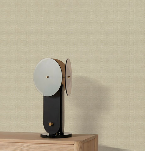 Modern table lamp with dual shades on wooden surface