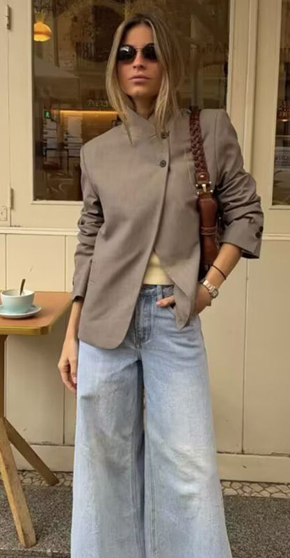 The asymmetric high-neck blazer