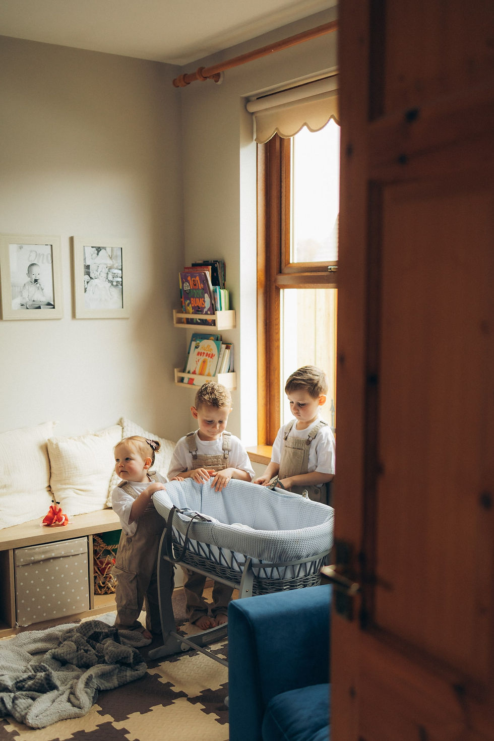 Newborn - siblings at moses basket