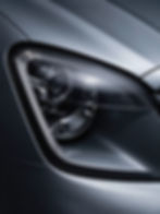Polished car headlight after car detailing service