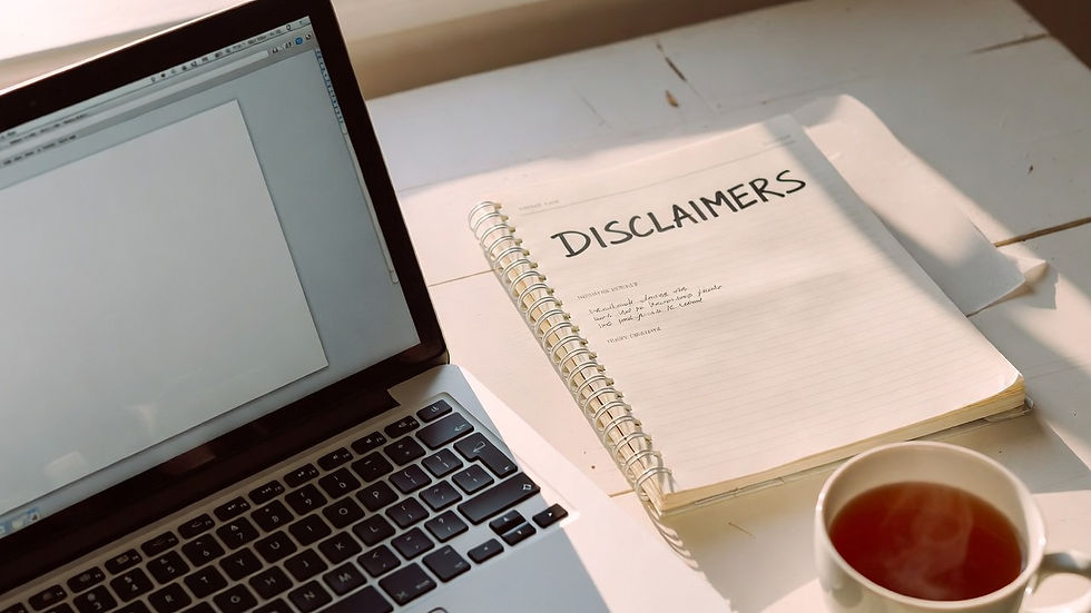 UK digital product seller's desk with laptop and notes on legal disclaimers